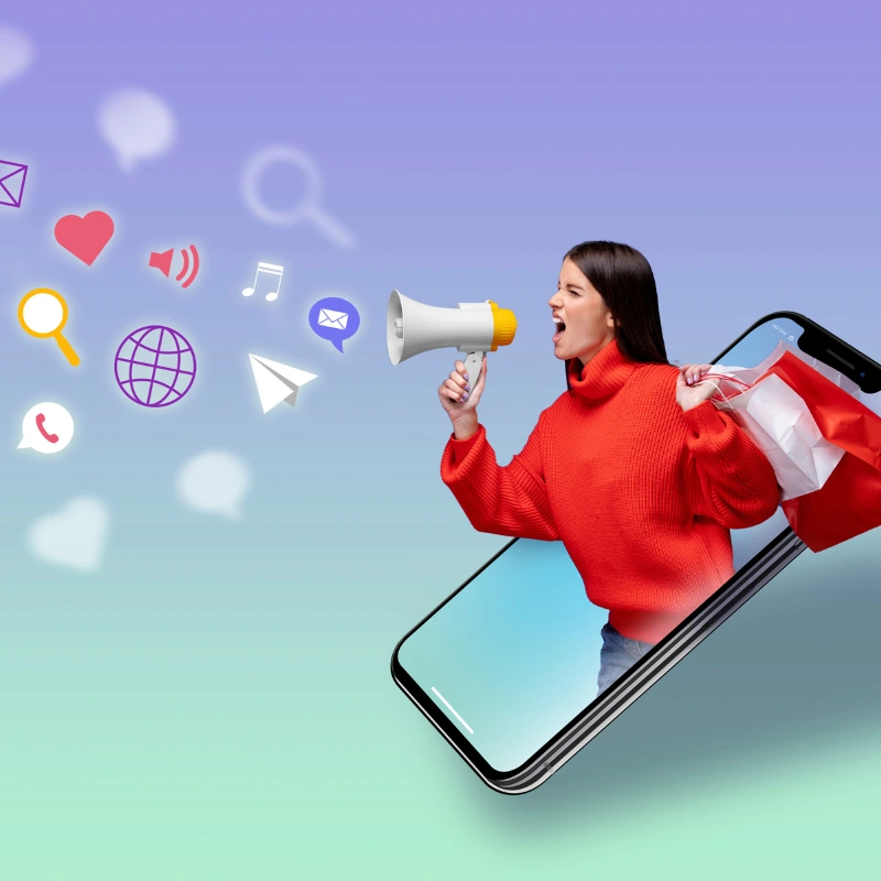 a women popping out of a mobile screen with handheld megaphone at google ads expert in calicut